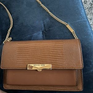 Authentic used and good condition Michael Kors Crossbody in Tan with gold chain